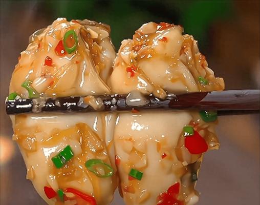 青蒜炒海蛎子（传统美食，营养丰富的海鲜佳肴）